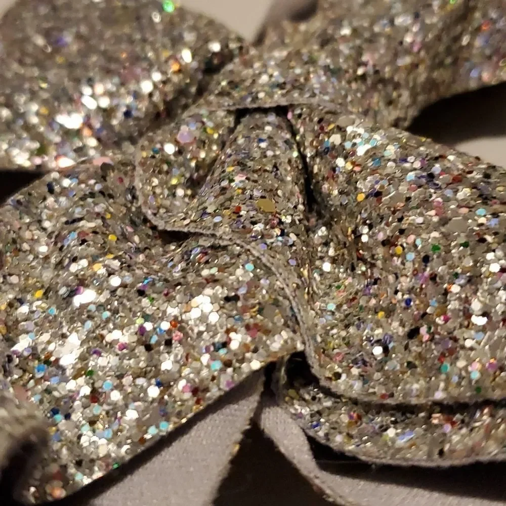 Girls Silver Glitter Bow Clip